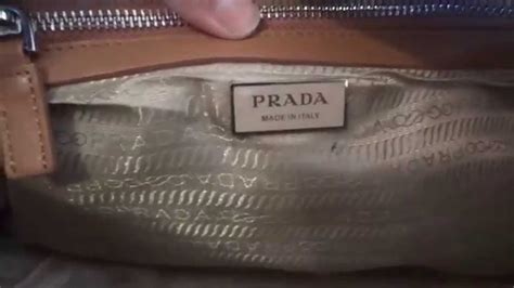 how to identify a real prada handbag|prada handbag clearance sale.